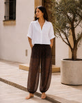 Pantalón ancho plisado con estampado animal - 1-blanco